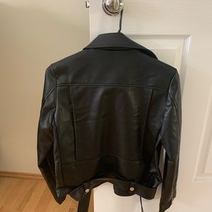 Woman’s man made leather jacket, with silver details